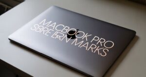 Close-up image showing MacBook Pro screen burn marks with visible dark patches and uneven brightness on the display.