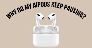 “Close-up of AirPods in ears with iPhone showing paused music, illustrating why do my AirPods keep pausing issue.”