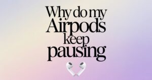 “Close-up of AirPods in ears with iPhone showing paused music, illustrating why do my AirPods keep pausing issue.”